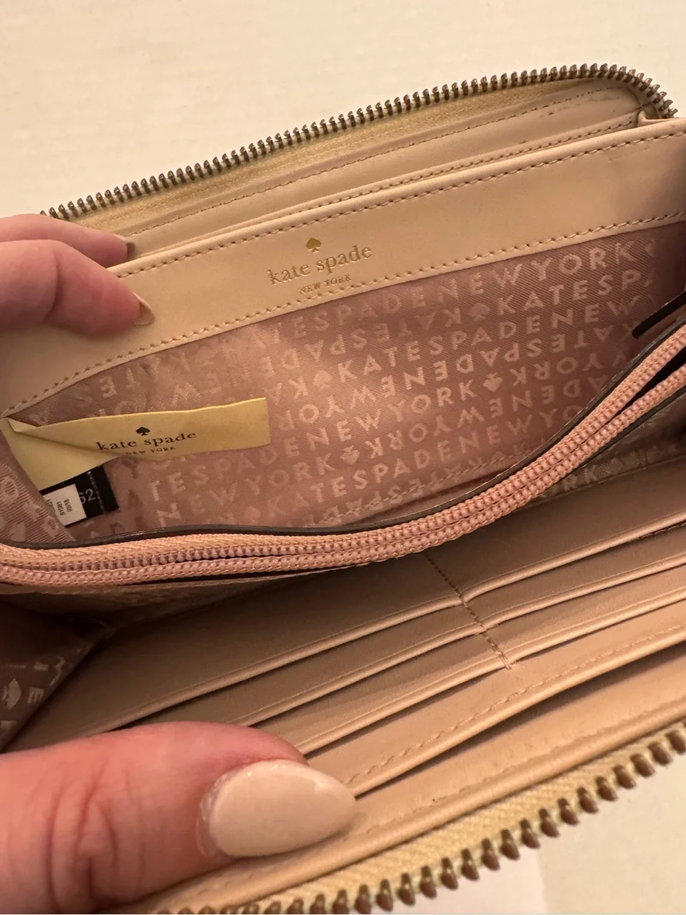 Kate Spade New York Beige Zip-Around Wristlet Wallet with Logo Accent Wristlet